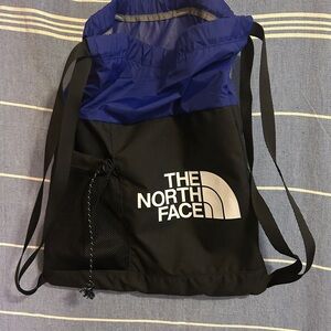 The North Face Black and Blue Drawstring Bag